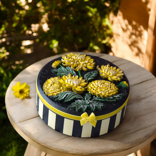 Round jewelry box with yellow flowers